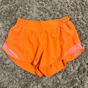 Highlighter orange Lululemon shorts
